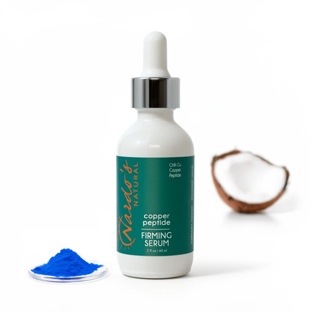Copper peptide firming serum bottle with blue powder and coconut on a white background