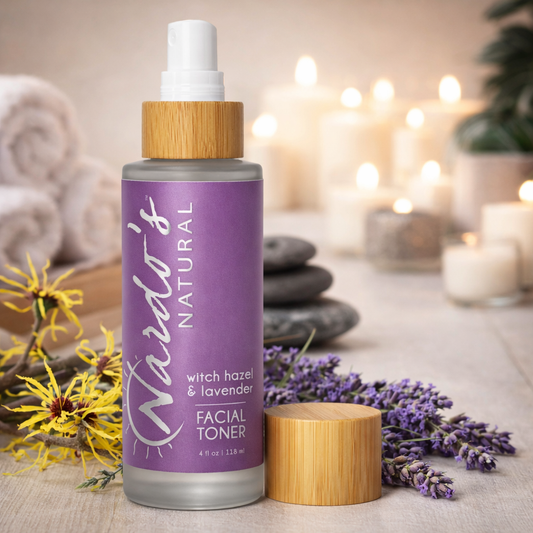 Narolo's Natural Witch Hazel & Lavender Facial Toner bottle with wooden cap on a blurred background of candles and flowers.