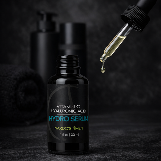 Black serum bottle with dropper labeled 'Nardo's 4 Men' on a dark background